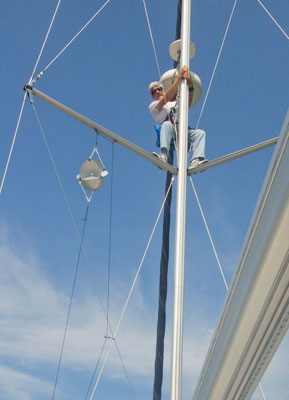 Larry climbs mast